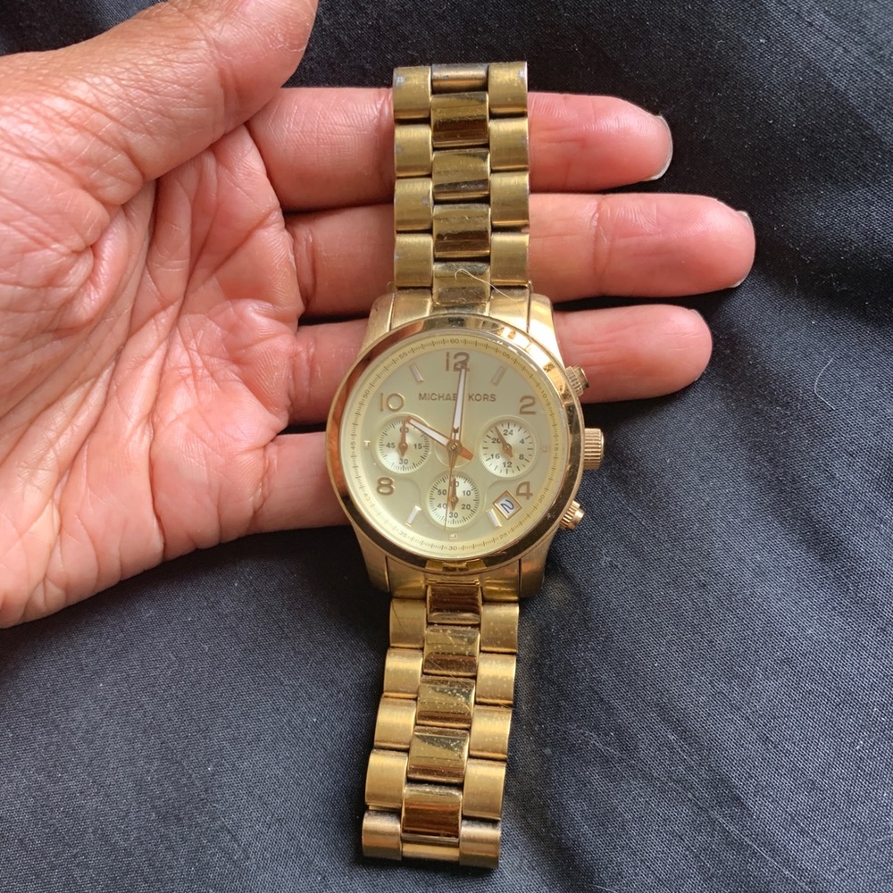 Gold MK watch